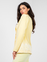 Pastelowa żółta elegancka marynarka z koronką