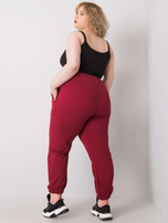 Bordo spalvos plus size sportinės kelnės su kišenėmis Ainhoa.