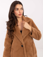 Camel teddy coat with button closure.