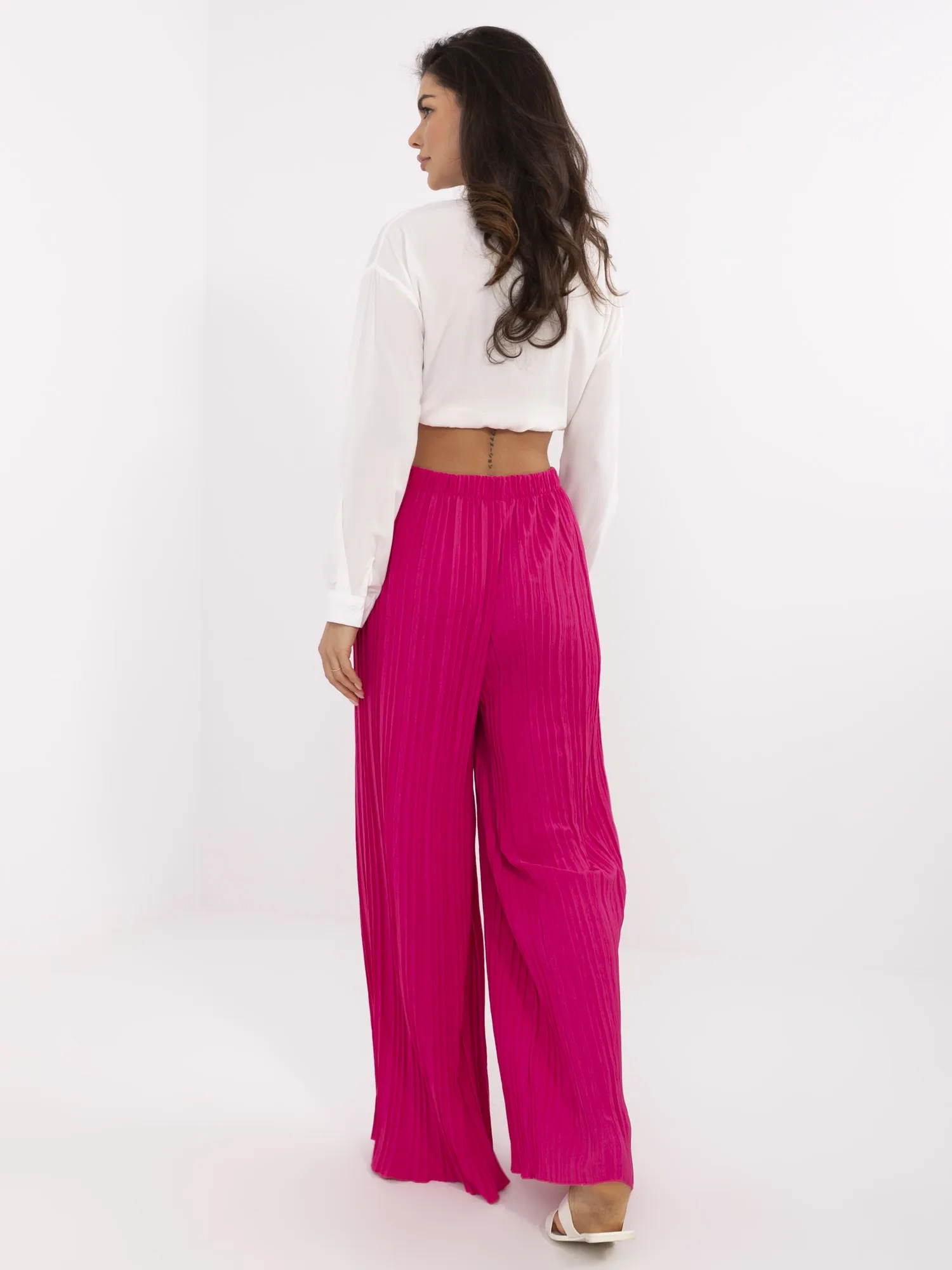 Fuchsia strukturierte Hose mit Gummizug in der Taille.