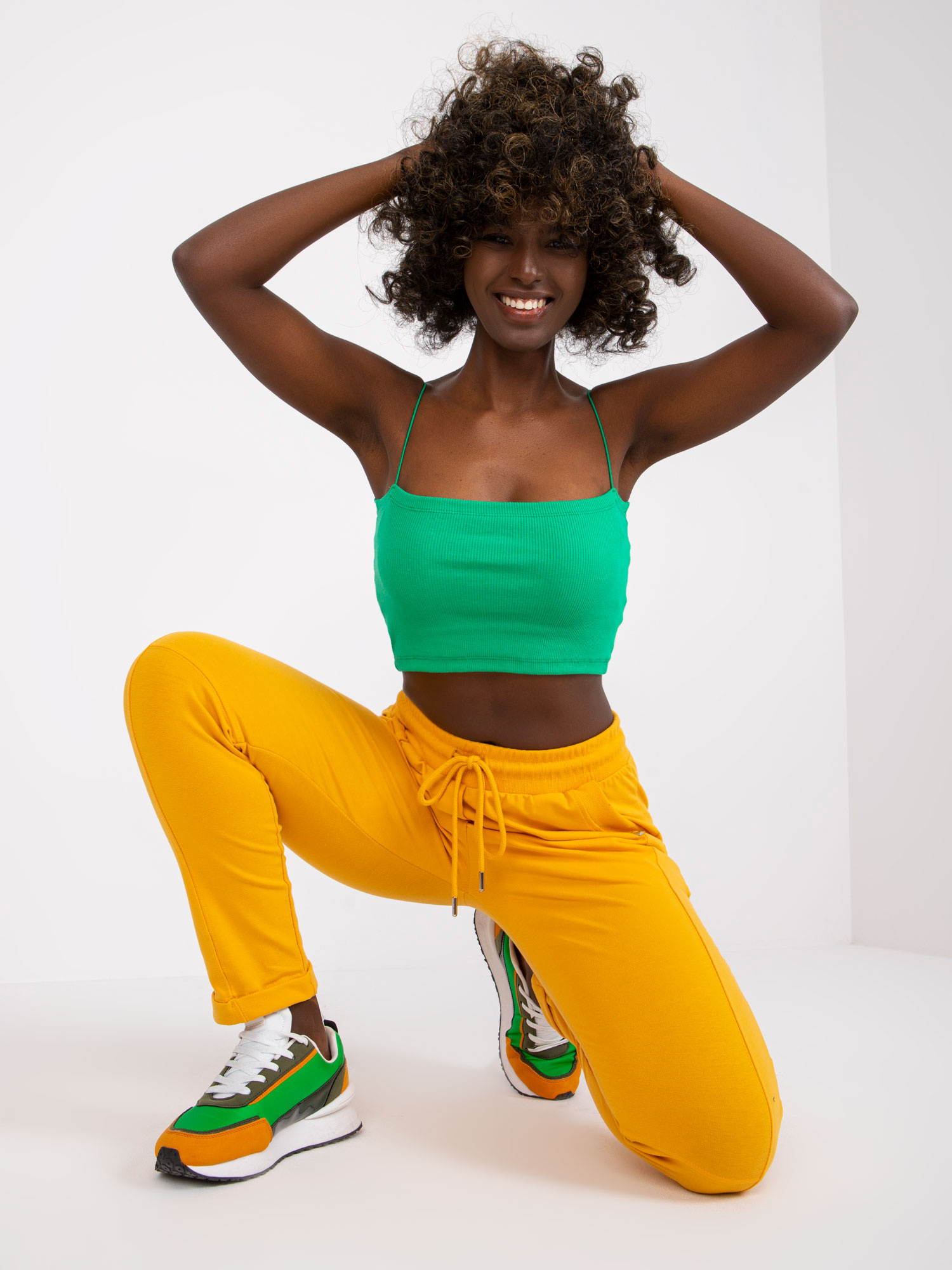 Bright orange basic sweatpants with pockets.