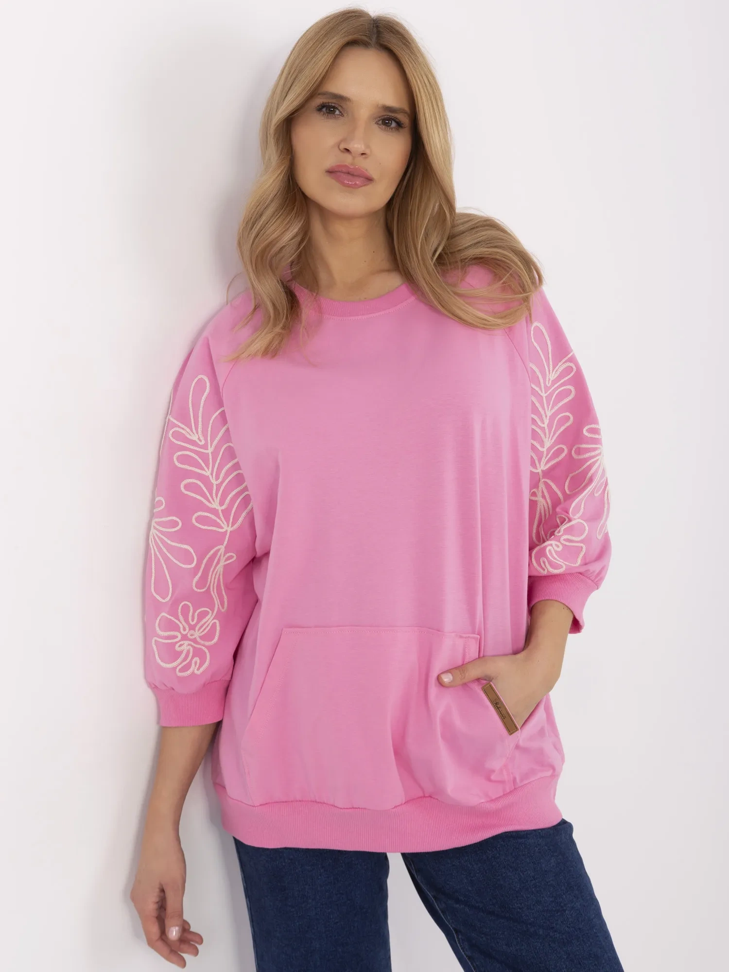 Rosa Damen Kapuzenpullover aus Baumwolle.