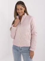 Light pink transitional jacket with lining.