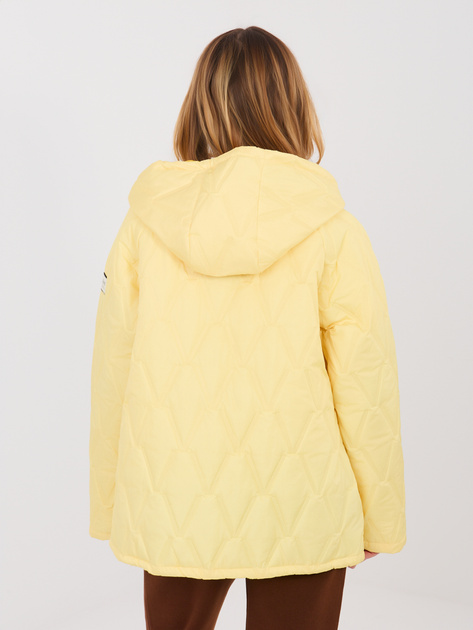 Pastelowa żółta pikowana kurtka z kieszeniami