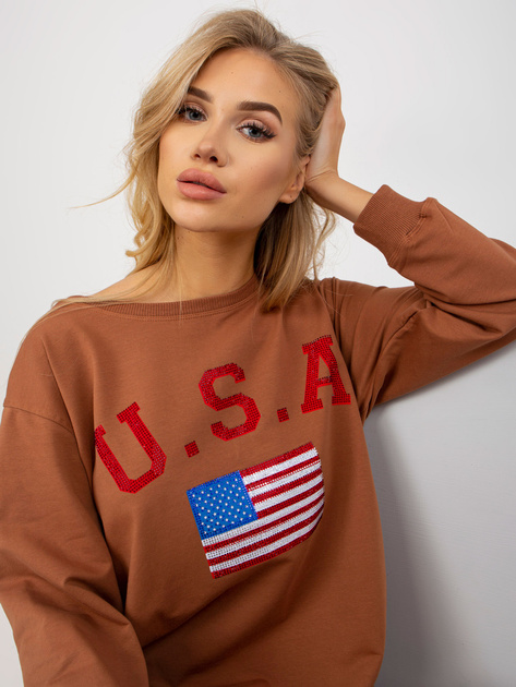 Hurtownia Jasnobrązowa długa bluza z nadrukiem i aplikacją