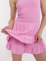 Pink muslin sleeveless jumpsuit.