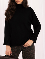 Black women's oversized turtleneck sweater.