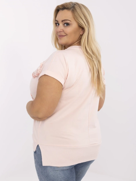 Jasnoróżowa bluzka plus size z aplikacjami