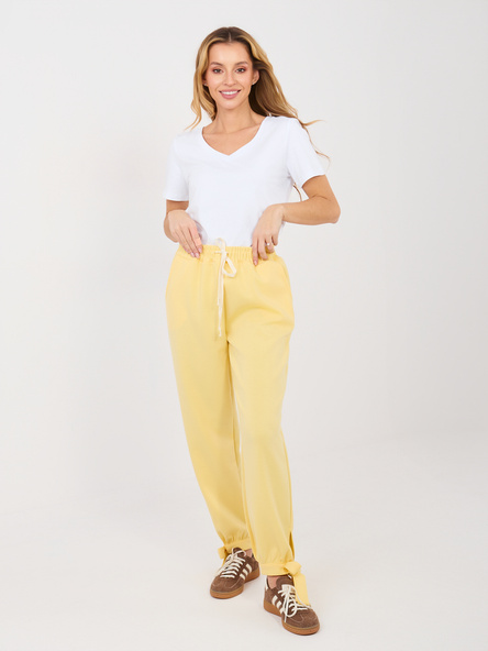 Jasnożółte dresowe spodnie z kieszeniami