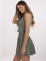 Khaki two-piece set in tennis style.