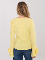Jasnożółta bluzka z rękawem typu dzwon