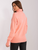 Hurt Brzoskwiniowy damski golf z warkoczami