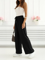 Czarne szerokie spodnie na lato