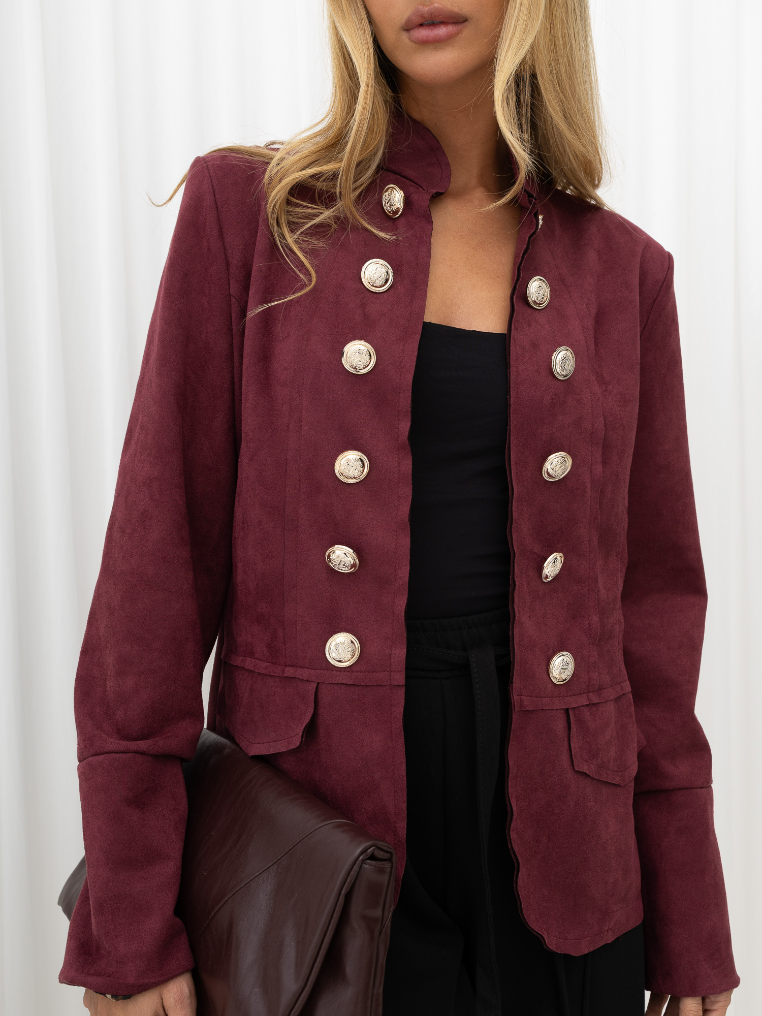 Burgundy women's jacket in royal military style.
