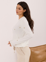 Ecru women's sweater with shiny thread.