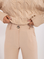 Hurt Beżowe spodnie materiałowe z zapięciem na guzik