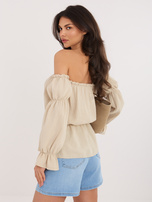 Beige muslin off-shoulder blouse made of cotton.