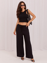 Black wide pants with a tie.