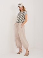 Beżowe spadochronowe spodnie z nogawką 7/8 RUE PARIS 