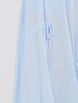 Jasnoniebieska rozkloszowana spódnica z wiązaniami