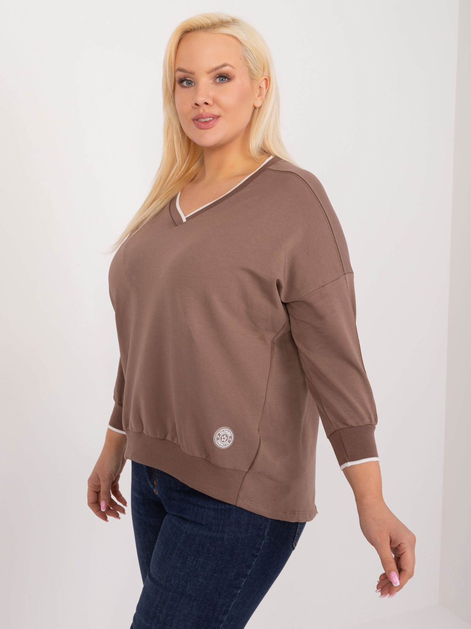 Großhandel Braune Bluse in Übergröße mit Bündchen.