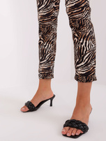 Beige-black suit fabric pants.