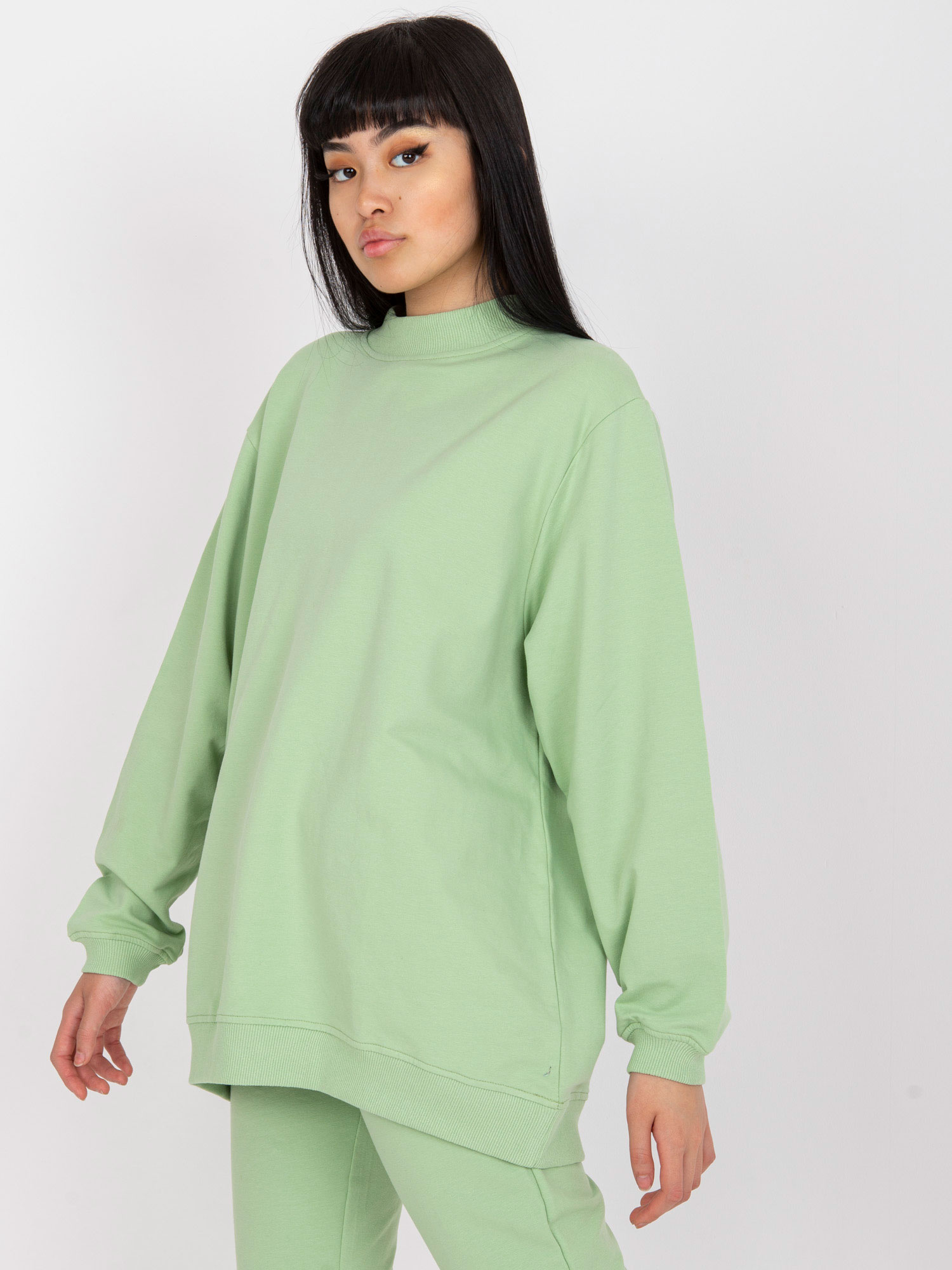 Pistazienfarbener Oversize-Sweatshirt aus Baumwolle.