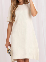 Light beige elegant knee-length dress.