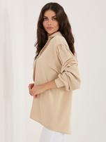 Beżowa wizytowa bluzka z broszką