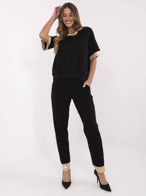 Czarny dwuczęściowy komplet ze złotymi wstawkami