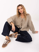 Beżowy kardigan z falbankami przy rękawach