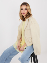 Jasnożółta rozkloszowana bluzka z haftem 