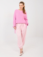 Jasnoróżowe dresowe spodnie ze ściągaczami