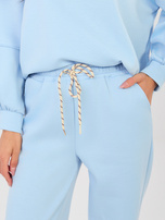 Jasnoniebieskie dresowe spodnie ze ściągaczami 