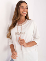 Ecru women's blouse with ties.