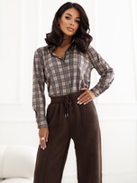 Beige checkered shirt made of faux suede.