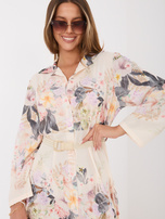 Light beige floral shirt dress.