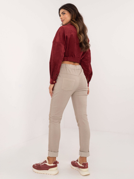 Hurt Beżowe połyskujące spodnie materiałowe z kieszeniami