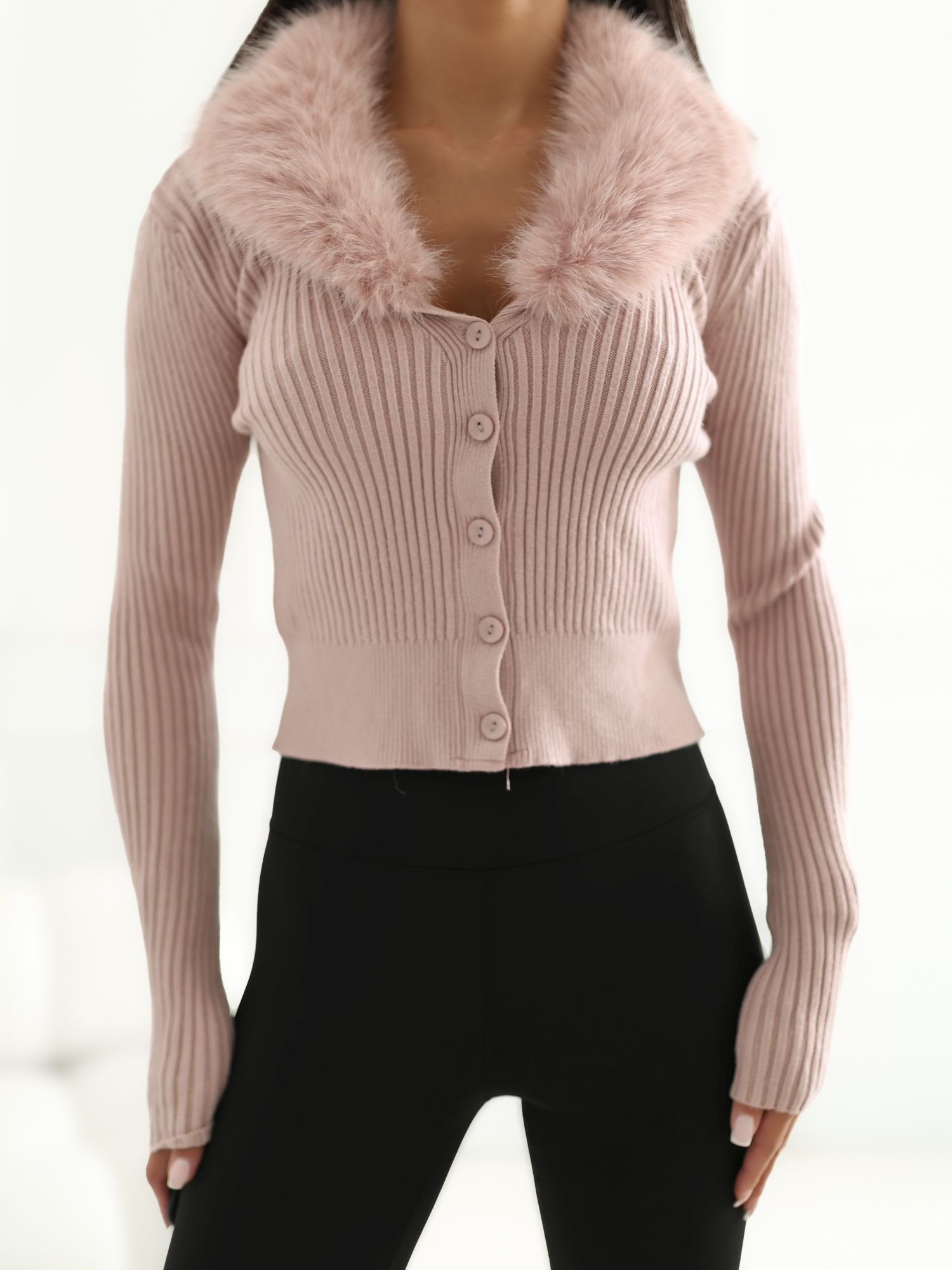 Light pink ribbed sweater with fur.