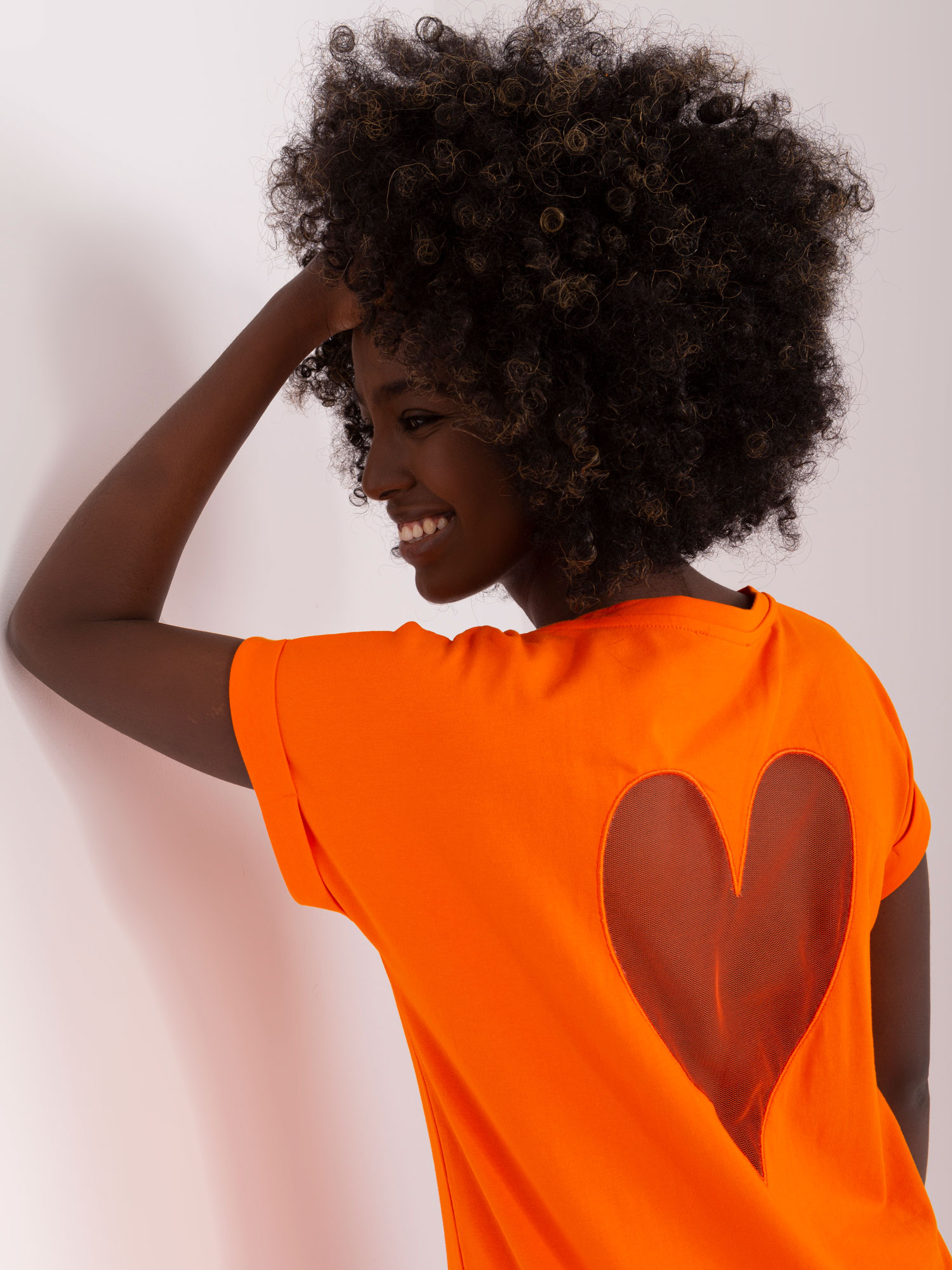 Hurt Orange Bluse mit transparentem Einsatz.