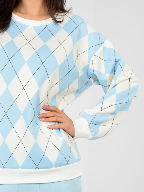 Pastelowa niebieska bluza w geometryczne wzory