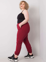 Bordo spalvos plus size sportinės kelnės su kišenėmis Ainhoa.