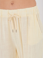 Jasnożółte szerokie spodnie na lato