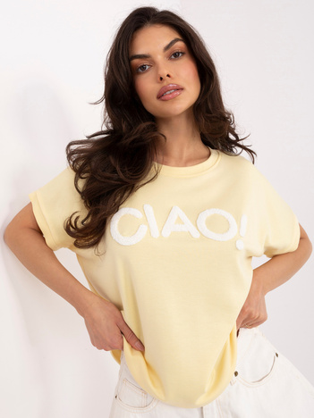 Jasnożółta bluzka z kontrastowym napisem RUE PARIS