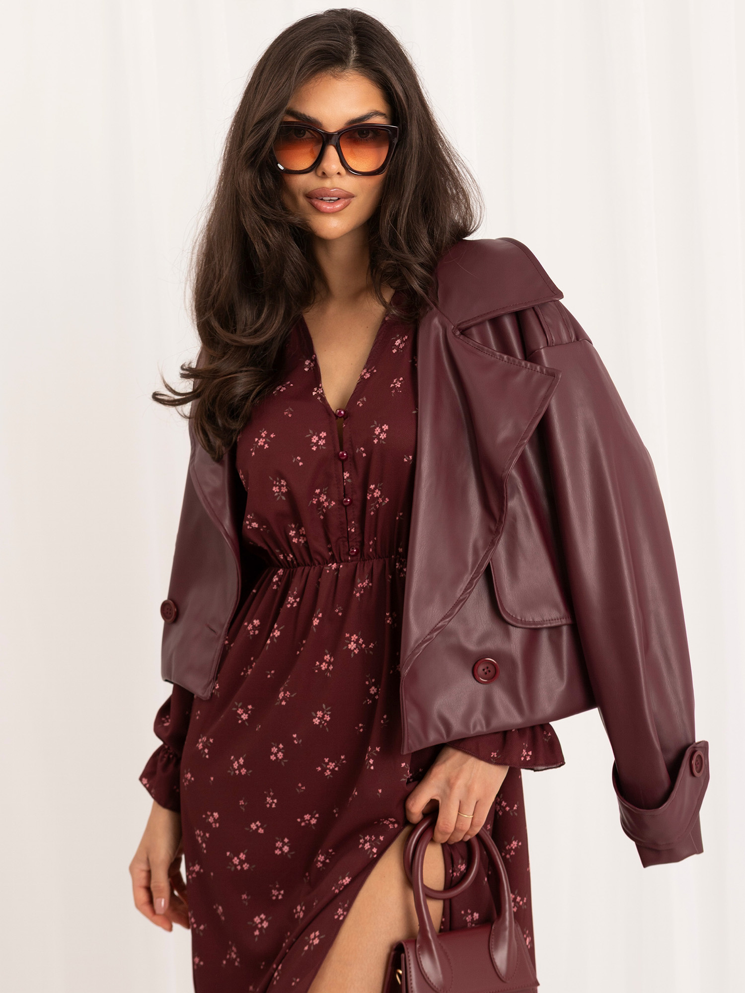 Burgundy flared dress with flowers.