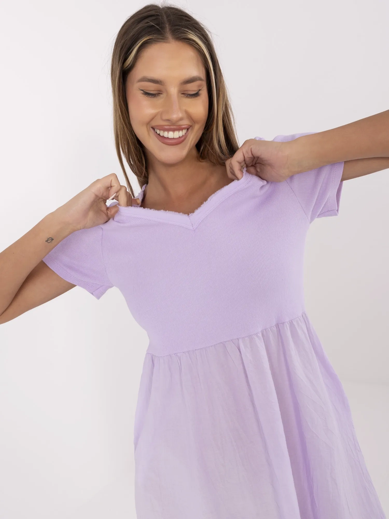 Light purple dress with a V-neck.