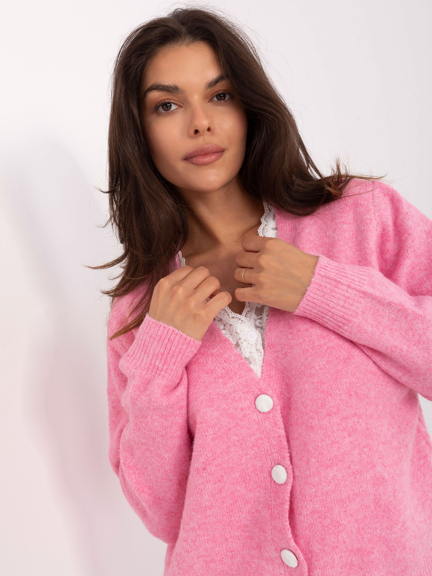 Rosa offene Strickjacke mit Wollanteil.