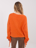 Pomarańczowy sweter oversize ze ściągaczami