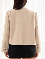 Beige Napoleon-style blazer with a collar.
