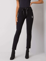 Czarne spodnie dresowe rurki z lampasami Mannice